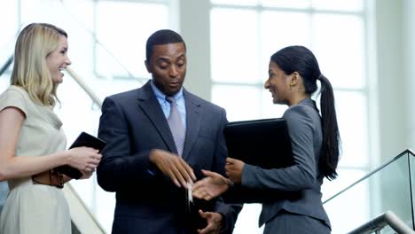 multi ethnic business people meeting together in office