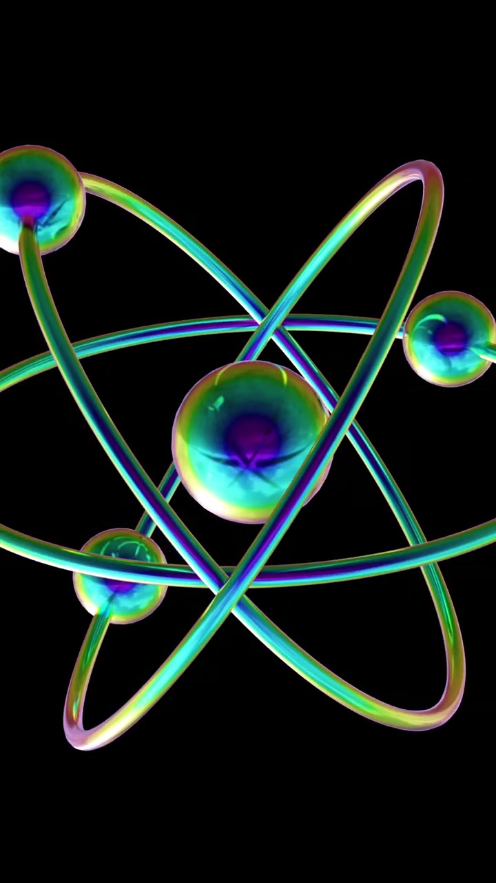 Animation of atom model spinning on black background