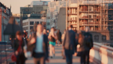 anonymous crowd of people walking  commuters london city street slow motion