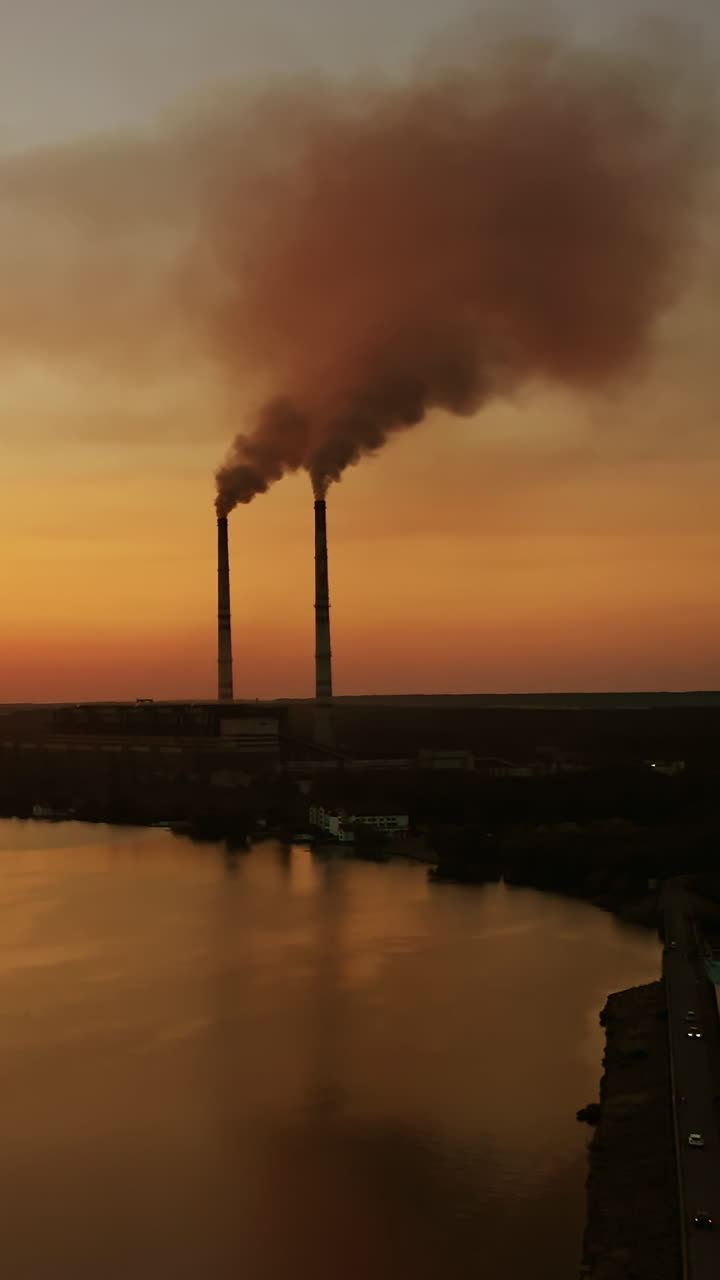 Smoking chimney from factory. Air pollution by smoke from factory chimneys