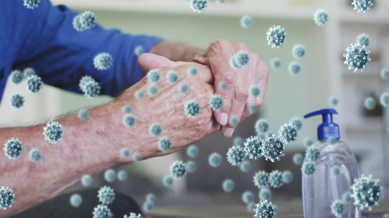 animación de la caída de las células de covid-19 sobre el hombre lavando las manos