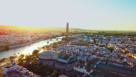 Moviéndose-Hacia-El-Río-Guadalquivir-En-Sevilla-Durante-Una-Hermosa-Puesta-De-Sol-4k-23fps