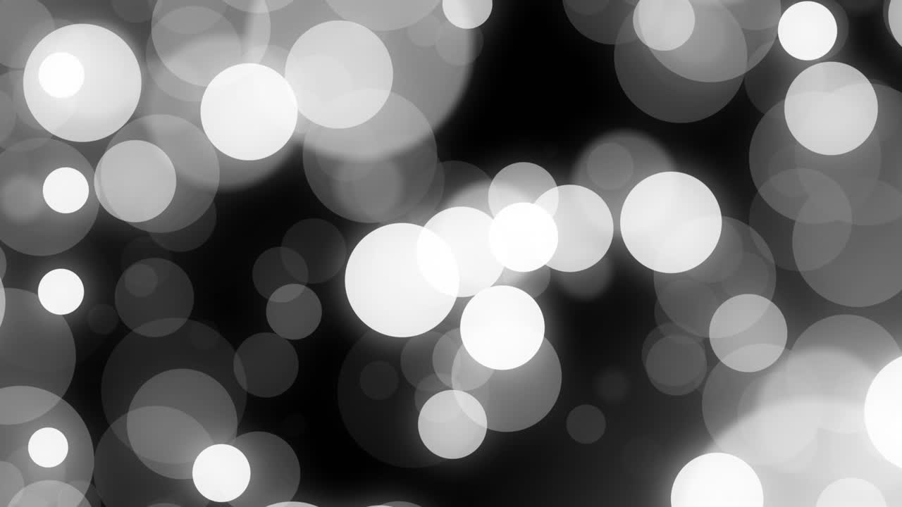 Moving bokeh starting script appearing while bell growing and holly forming, revealing festive word