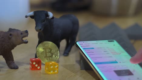 crypto investment trading btc usdt on mobile. mobile trading set from an app on smartphone. speculation concept