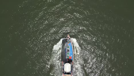 aerial view of a boat traveling on water