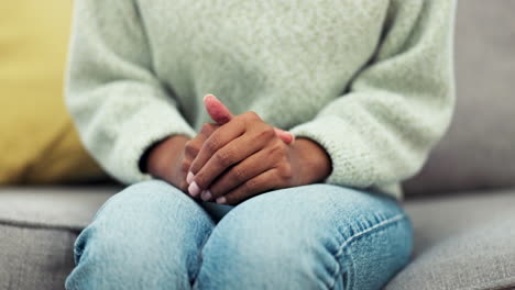 Hands,-anxiety-and-woman-on-sofa-in-counselling