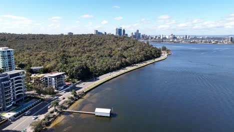 drone rising over the famous blue boat house in perth, western australia