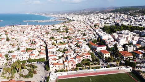 Beautiful-colorful-town-of-Rethymno-in-Crete-island,-aerial-view