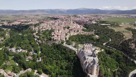 spectacular alcazar de segovia, sierra de guadarrama in background