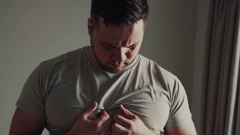 man experiencing chest pain
