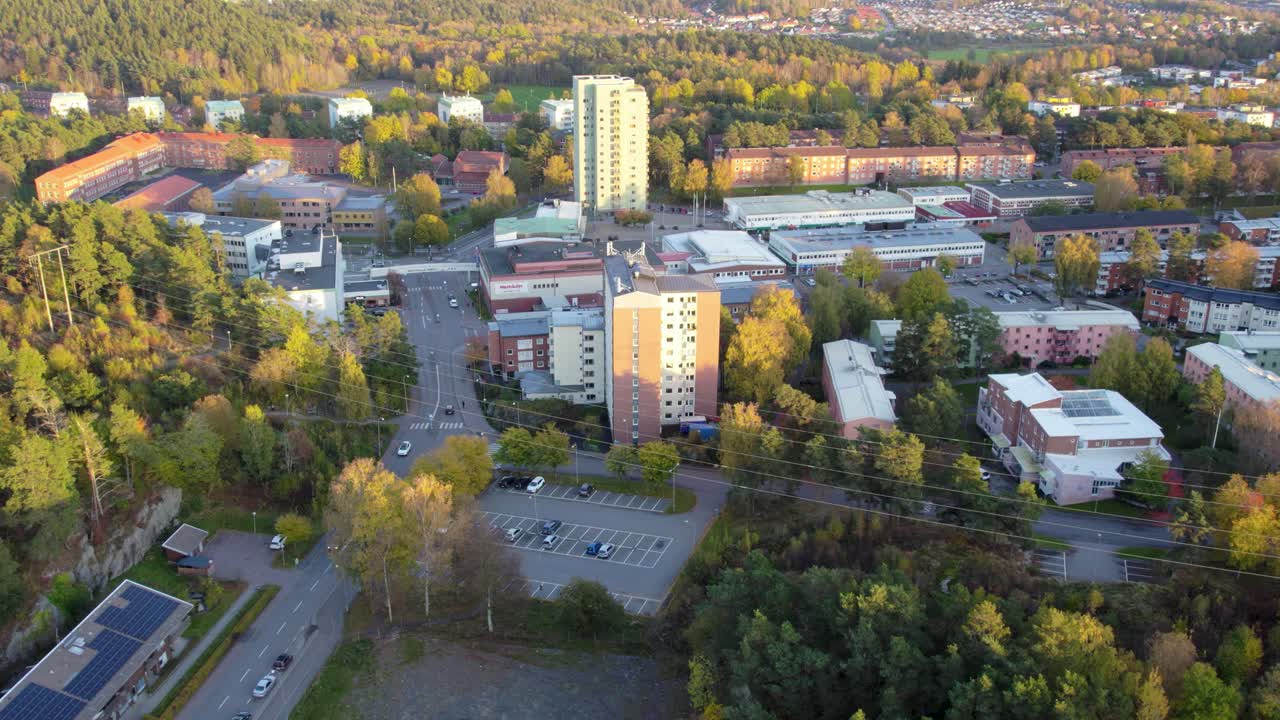 Aerial: Kortedala district with residential area during the day in Gothenburg, Sweden, establishing drone shot