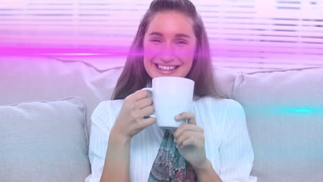 Animation-of-light-trails-over-biracial-woman-holding-mug-and-drinking