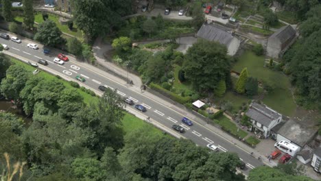 top view of traffic jam at rush hour in riverside valley village. canoeing
