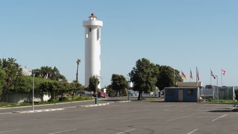 tubular white milnerton lighthouse in table bay in cape town, rsa