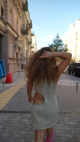 woman walking in a city