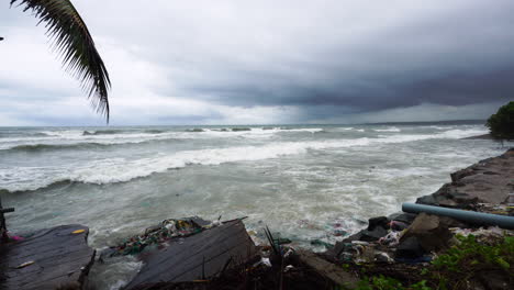 rising sea levels battering the coastal areas of thailand with trash and debris