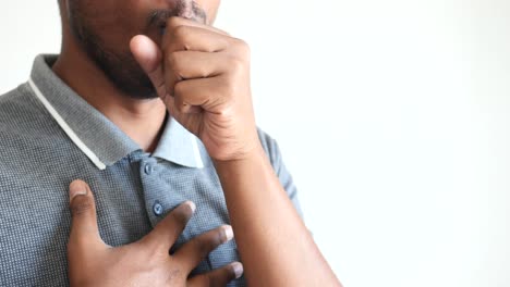 man coughing