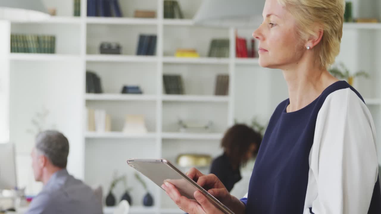 Business woman on her touch pad