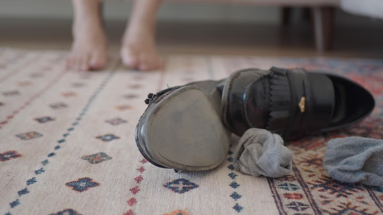Shoes and Socks on a Carpet