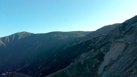 aerial view of mountain side with sunset flares