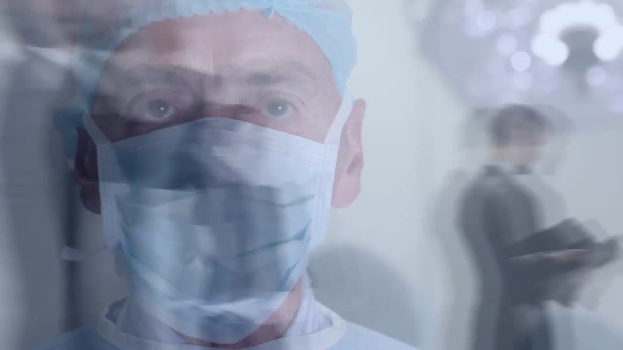 Animation of male surgeon wearing face mask and people walking in fast motion