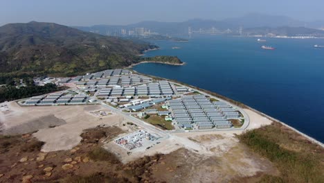 Covid19-Quarantine-compound-buildings-in-the-outskirts-of-Hong-Kong,-Aerial-view