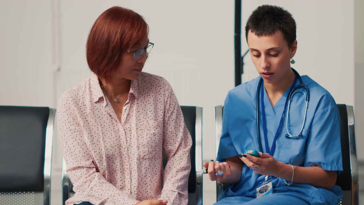 Nurse Checking Patient's Blood Sugar Level