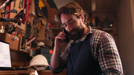 Phone-call,-manufacturing-and-a-craftsman