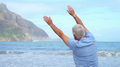 Senior-man-performing-stretching-exercise