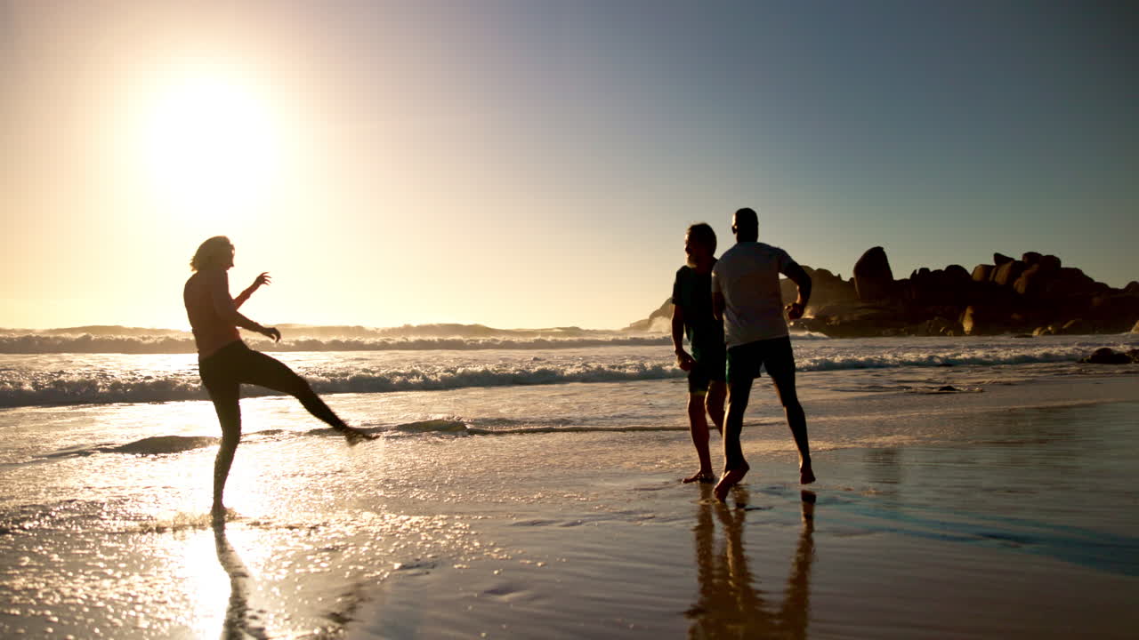 People enjoying a sunset on the beach