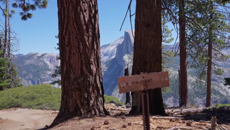 footage featuring the glacier point sign in yosemite national park, california, with a scenic view of half dome in the background