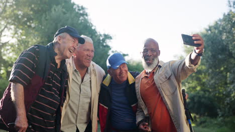 senior friends taking a selfie outdoors