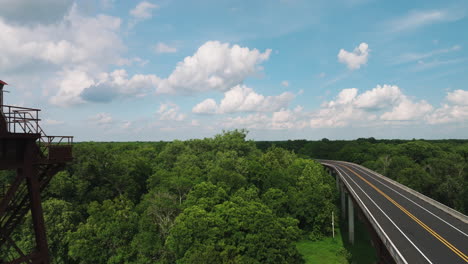 aerial view of the main road highway over white river near old railway in twin city riverfront park, arkansas, usa