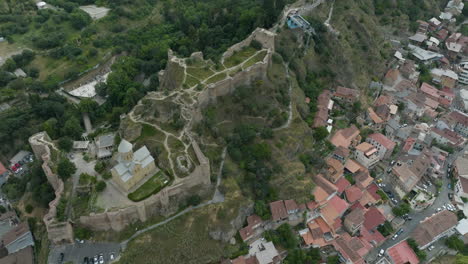 Aerial-dolly-out-shot-of-the-Narikala-fortress-and-the-St