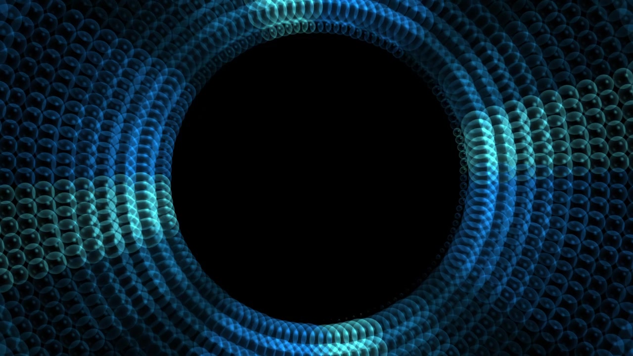 Abstract Blue Glowing Spheres Rotating in Circular Pattern