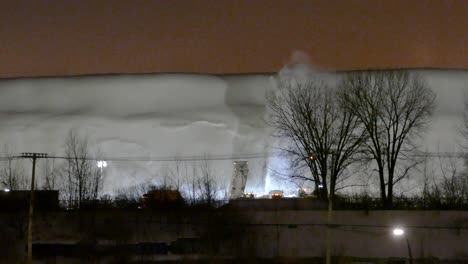 sopladores de nieve - operación de remoción de nieve por la noche en montreal, canadá