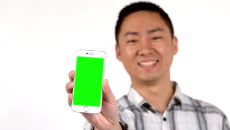 Smiling-man-showing-his-smartphone