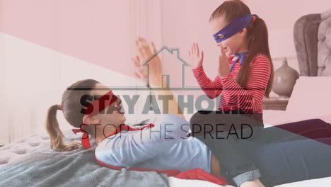 animation of words stay home and stop the spread written over woman and her daughter at home