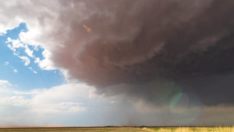 a land-spout tornado touches down in the texas panhandle, picking up dust and debris