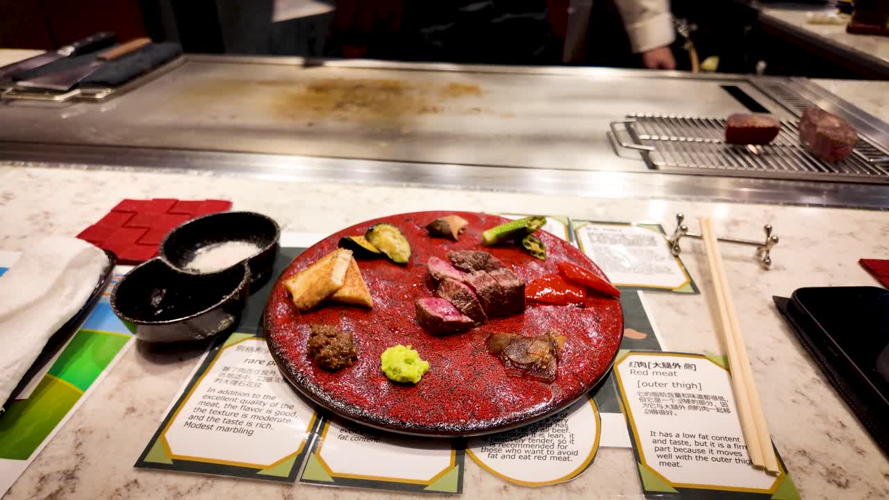 Kobe beef with vegetables served on a plate on one of top Osaka restaurant