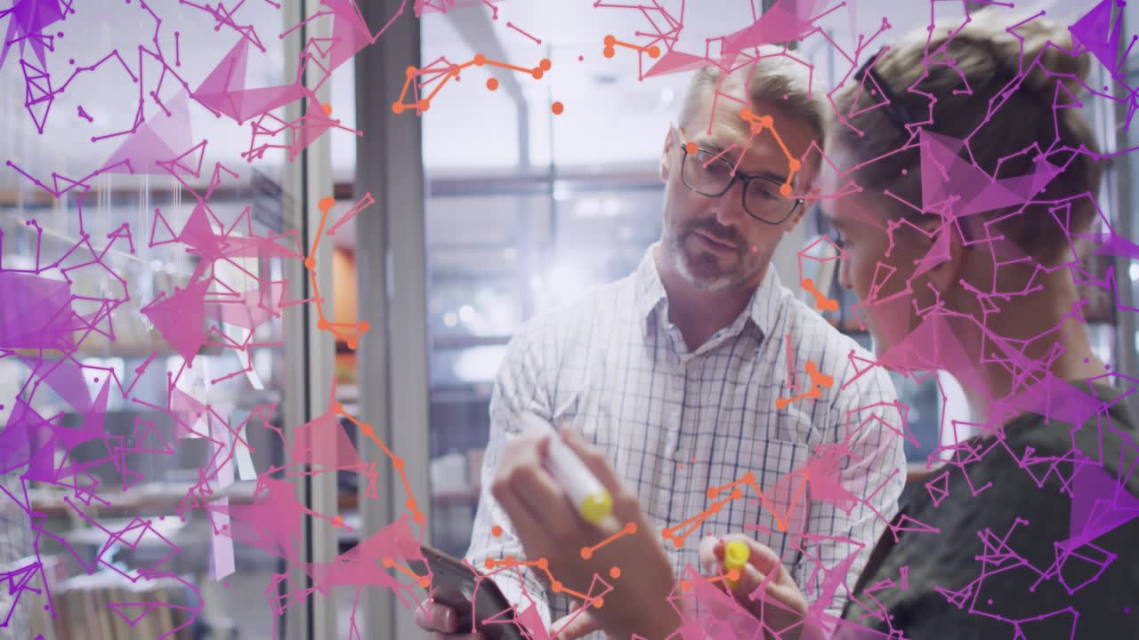 Mentor pointing at glass and starting business planning while purple overlay partly obscuring view