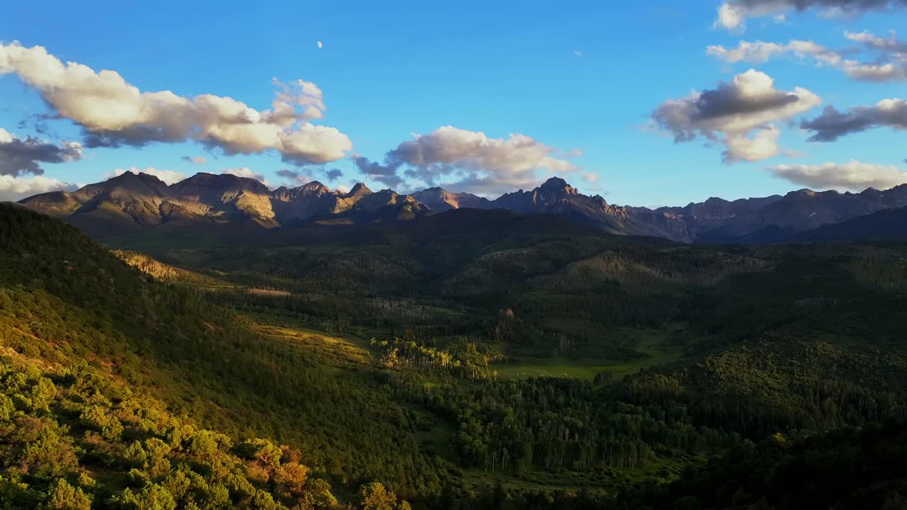 Ridgway Colorado summer Mount Sneffels Wilderness aerial drone sunset golden hour moon Aspen Tree forest grove ranch farmland Montrose Telluride Dallas Divide San Juan Rocky Mountains circle right pan