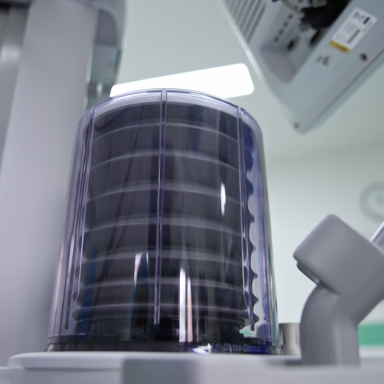 Artificial respiration machine pump going up and down. Equipment in modern surgery room. Low angle perspective