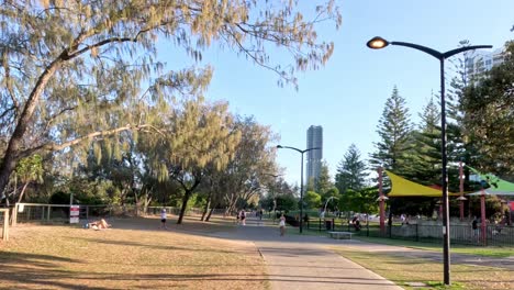 people enjoying outdoor activities in a city park