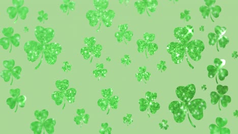 animation of  shimmering green shamrocks falling