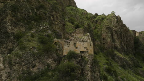 rising tmogvi fortress ruins in caucasus mountains in samtskhe-javakheti, southern georgia