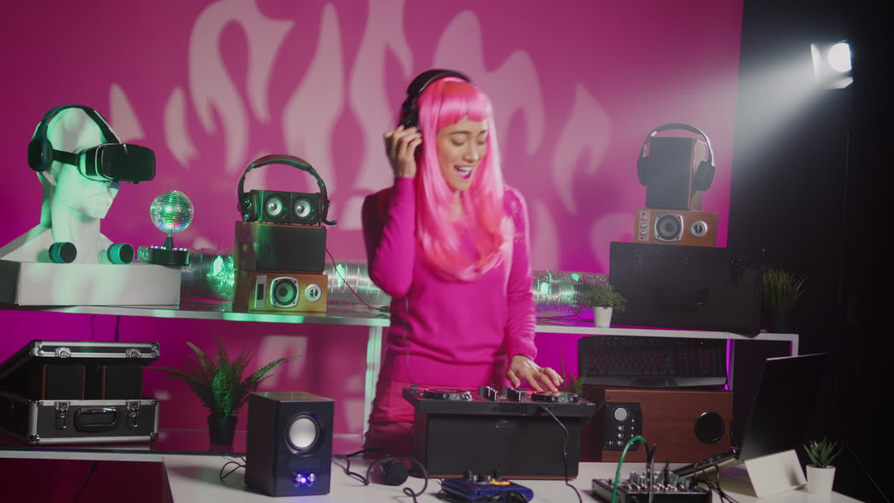 Woman DJ with Pink Wig Playing Music