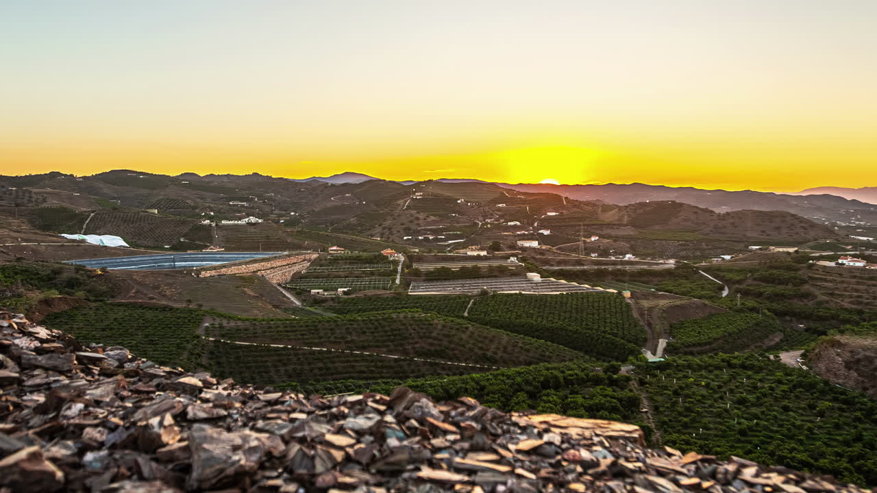 Sunrise high viewpoint overlooking wonderful deep valley, early morning agriculture field