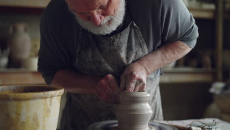 senior potter at work