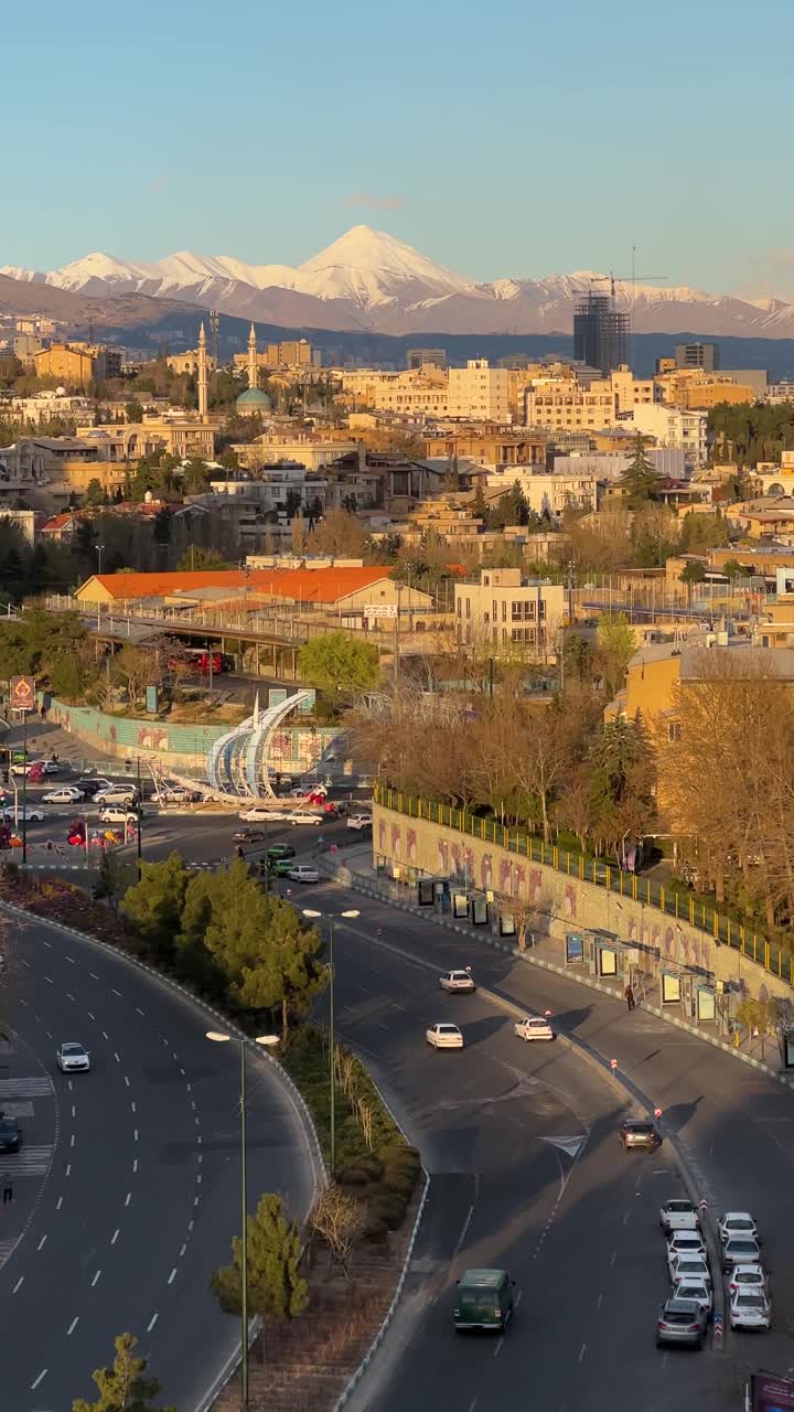 Damavand mountain urban architecture Tehran air pollution climate weather cityscape Milad Tower Azadi Gate Persian culture historic landmark sunset skyline modern monument tourism freedom Middle East